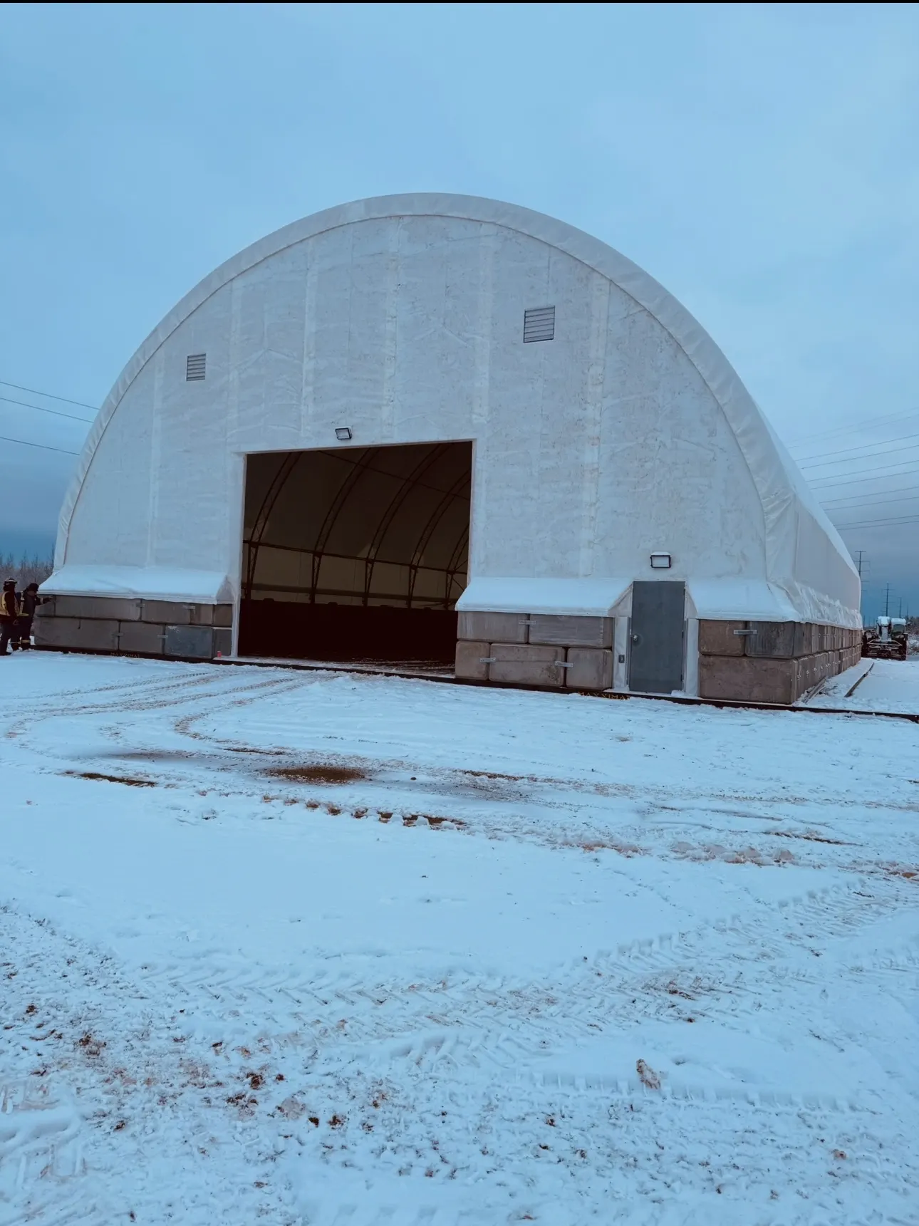 Pipe storage building at Fort McKay in winter